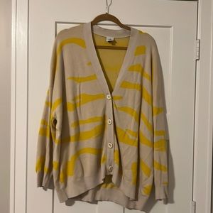 Cabi Roar Cardigan. Oversized sweater in cream and yellow.
